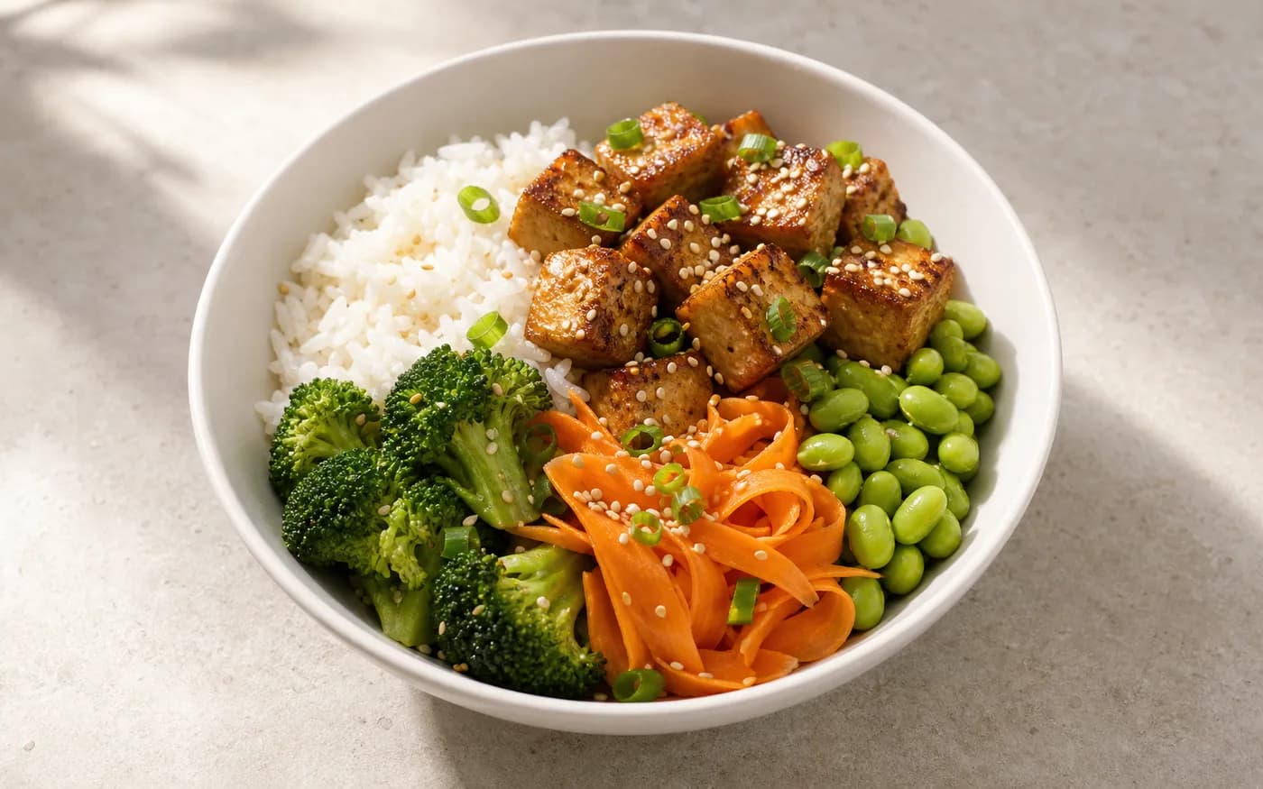 Miso sesame tofu bowl with rice and vegetables